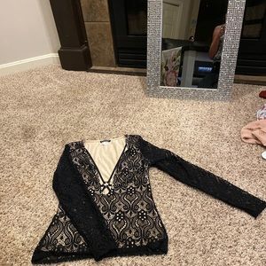 Very cute sexy low cut long sleeve lace top
